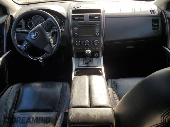 2015 Mazda CX-9 Grand Touring with VIN JM3TB2DV3F0455899, listed as a Copart auction lot 75697794 with 137,551 mi miles and Salvage Title. Bid and sale history available at carsss.com. Image 8.