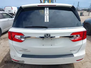 2019 Honda Odyssey Elite z VIN 5FNRL6H91KB110452, wystawiony jako IAAI lot #42630514 z przebiegiem 64 349 mil mil oraz . Historia ofert i sprzedaży dostępna na DreamBid. Obrazek 16.