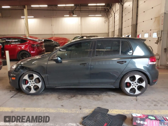 2012 Volkswagen GTI w/Sunroof & Navi PZEV with VIN WVWGD7AJ2CW100248, listed as a IAAI auction lot 41905190 with 106,489 mi miles and . Bid and sale history available at DreamBid. Image 14.