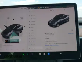 2023 Tesla Model Y Long Range with VIN 7SAYGDEEXPA078629, listed as a IAAI auction lot 42046354 with 27,245 mi miles and . Bid and sale history available at DreamBid. Image 7.