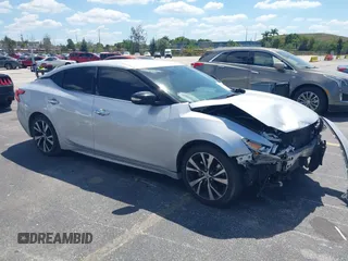 2018 Nissan Maxima SL z VIN 1N4AA6AP5JC384508, wystawiony jako IAAI lot #41832660 z przebiegiem 141 948 mil mil oraz . Historia ofert i sprzedaży dostępna na DreamBid. Obrazek 1.
