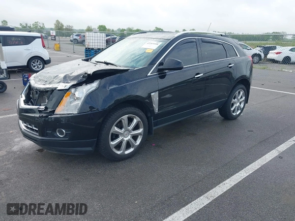 2015 Cadillac SRX Performance Collection with VIN 3GYFNCE3XFS638994, listed as a IAAI auction lot 42243558 with 141,704 mi miles and . Bid and sale history available at DreamBid. Image 2.