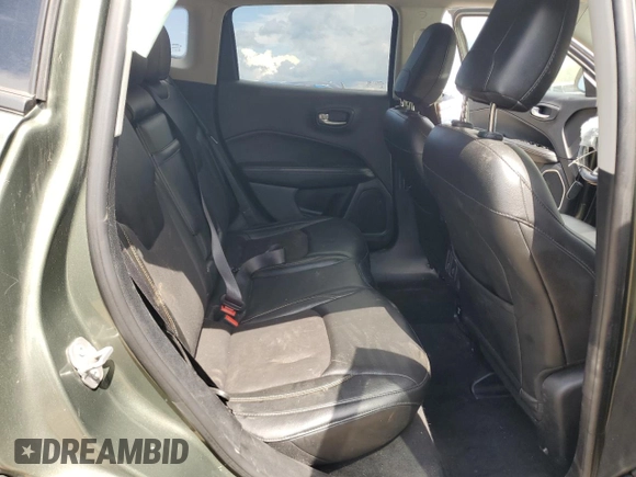 2018 Jeep Compass Latitude z VIN 3C4NJDBB3JT265878, wystawiony jako Copart lot #61999865 z przebiegiem 131 919 mil mil oraz Czysty tytuł • Clean title. Historia ofert i sprzedaży dostępna na DreamBid. Obrazek 11.