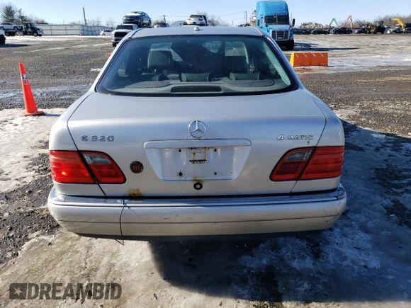 2000 Mercedes-Benz E-Class with VIN WDBJF82J5YX030071, listed as a Copart auction lot 42430025 with 122,612 mi miles and Salvage Title. Bid and sale history available at carsss.com. Image 6.