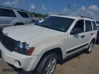 2006 Jeep Grand Cherokee Laredo with VIN 1J4GR48K36C334509, listed as a IAAI auction lot 40343794 with 202,746 mi miles. Bid and sale history available at carsss.com. Image 2.