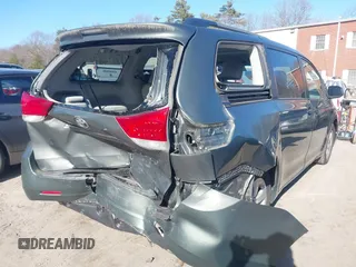 2011 Toyota Sienna LE AAS with VIN 5TDKK3DC0BS052186, listed as a IAAI auction lot 41808553 with 131,321 mi miles. Bid and sale history available at carsss.com. Image 4.