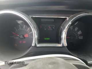 2007 Ford Mustang Deluxe z VIN 1ZVFT80NX75255793, wystawiony jako Copart lot #58993805 z przebiegiem 159 882 mil mil oraz Szkoda całkowita • Salvage title. Historia ofert i sprzedaży dostępna na DreamBid. Obrazek 9.