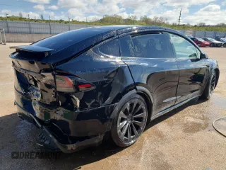 2022 Tesla Model X with VIN 7SAXCDE55NF341925, listed as a Copart auction lot 47607595 with Not Provided miles and Salvage Title. Bid and sale history available at DreamBid. Image 3.
