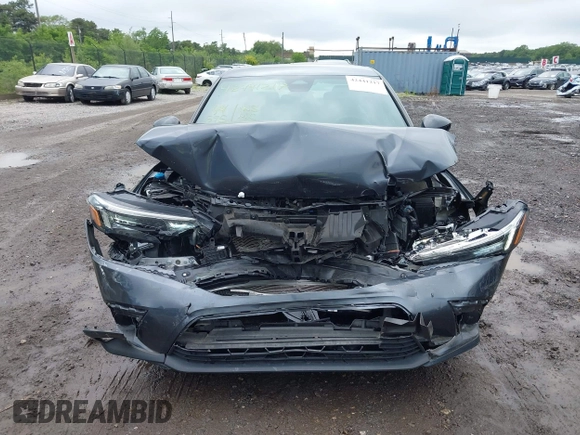 2023 Honda Civic Sport with VIN 2HGFE2F5XPH515699, listed as a IAAI auction lot 42441217 with 44,595 mi miles and . Bid and sale history available at DreamBid. Image 12.