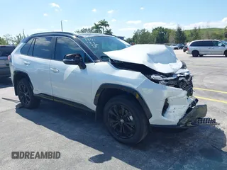 2024 Toyota RAV4 Hybrid XSE with VIN 2T3E6RFV9RW077941, listed as a IAAI auction lot 42012134 with 31,009 mi miles and . Bid and sale history available at DreamBid. Image 1.