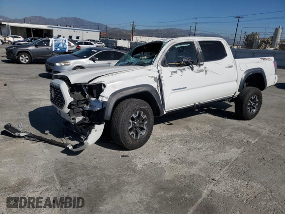 2020 Toyota Tacoma SR5 with VIN 3TMAZ5CN8LM115056, listed as a Copart auction lot 46948805 with 87,713 mi miles and Salvage title. Bid and sale history available at DreamBid. Image 1.