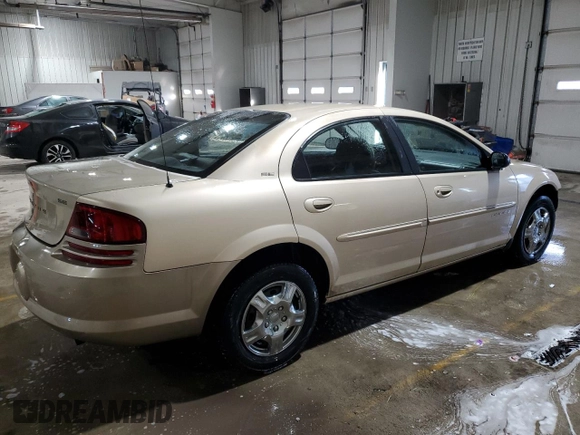 2001 Dodge Stratus z VIN 1B3EJ46XX1N626854, wystawiony jako Copart lot #41568585 z przebiegiem 127 245 mil mil oraz Szkoda całkowita • Salvage title. Historia ofert i sprzedaży dostępna na DreamBid. Obrazek 3.