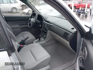 2003 Subaru Forester X with VIN JF1SG63623H732701, listed as a IAAI auction lot 41915863 with 245,313 mi miles. Bid and sale history available at carsss.com. Image 5.