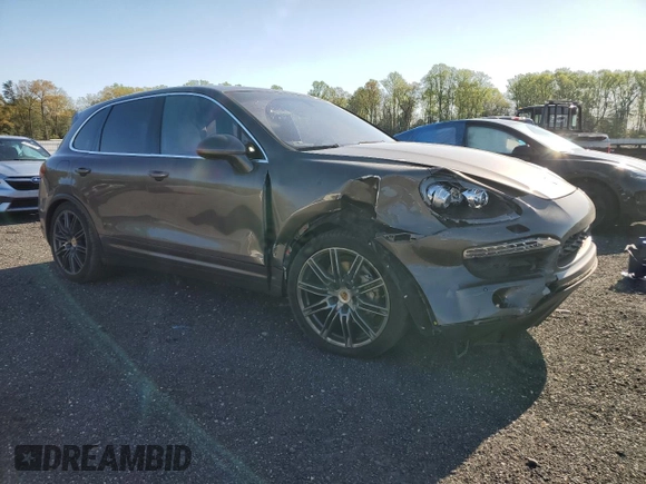 2012 Porsche Cayenne S z VIN WP1AB2A29CLA43084, wystawiony jako Copart lot #53424175 z przebiegiem Nie podano mil oraz Szkody całkowita. Historia ofert i sprzedaży dostępna na DreamBid. Obrazek 4.
