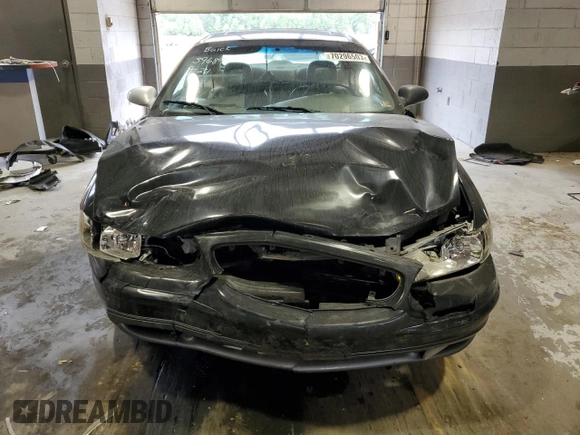 2000 Buick Regal GS with VIN 2G4WF5519Y1126067, listed as a Copart auction lot 70296503 with 216,502 mi miles and Salvage Title. Bid and sale history available at carsss.com. Image 5.