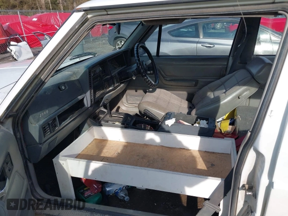 1994 Jeep Cherokee with VIN 1J4FB27S2RL240597, listed as a IAAI auction lot 41471551 with 413,893 mi miles and . Bid and sale history available at DreamBid. Image 5.