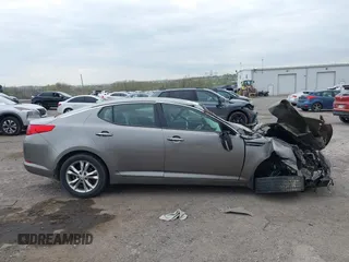 2013 Kia Optima EX z VIN 5XXGN4A77DG111541, wystawiony jako IAAI lot #42076690 z przebiegiem Nie podano mil oraz . Historia ofert i sprzedaży dostępna na DreamBid. Obrazek 12.
