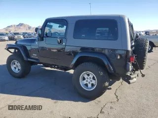 2005 Jeep Wrangler Unlimited with VIN 1J4FA44S75P305935, listed as a Copart auction lot 45993995 with 116,569 mi miles and Salvage Title. Bid and sale history available at carsss.com. Image 2.