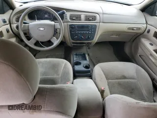2007 Ford Taurus SE with VIN 1FAFP53U27A176639, listed as a Copart auction lot 84345294 with Not provided miles and Clean title. Bid and sale history available at DreamBid. Image 8.