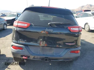 2015 Jeep Cherokee Trailhawk with VIN 1C4PJMBS8FW699319, listed as a Copart auction lot 61612245 with 173,581 mi miles and Clean title. Bid and sale history available at DreamBid. Image 6.