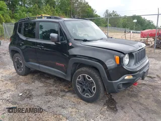 2017 Jeep Renegade Trailhawk z VIN ZACCJBCB3HPF32738, wystawiony jako IAAI lot #42206193 z przebiegiem 142 797 mil mil oraz . Historia ofert i sprzedaży dostępna na DreamBid. Obrazek 1.