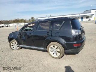 2010 Mitsubishi Outlander SE with VIN JA4AS3AW1AZ014063, listed as a Copart auction lot 79934964 with 140,404 mi miles and Salvage Title. Bid and sale history available at carsss.com. Image 2.