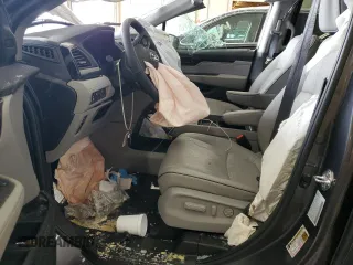 2023 Honda Odyssey Elite with VIN 5FNRL6H98PB056770, listed as a Copart auction lot 56984055 with Not provided miles and Salvage title. Bid and sale history available at DreamBid. Image 7.