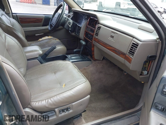 1993 Jeep Grand Cherokee Limited z VIN 1J4GZ78Y7PC531299, wystawiony jako IAAI lot #42117795 z przebiegiem 168 995 mil mil oraz . Historia ofert i sprzedaży dostępna na DreamBid. Obrazek 5.