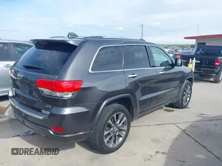 2017 Jeep Grand Cherokee Overland z VIN 1C4RJECG1HC614740, wystawiony jako IAAI lot #41912523 z przebiegiem 177 353 mil mil oraz . Historia ofert i sprzedaży dostępna na DreamBid. Obrazek 4.