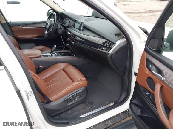 2015 BMW X5 sDrive35i with VIN 5UXKR2C54F0H34975, listed as a IAAI auction lot 41704467 with 92,006 mi miles. Bid and sale history available at carsss.com. Image 5.