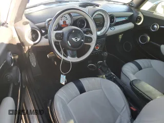 2014 MINI Convertible S with VIN WMWZP3C58ET706941, listed as a Copart auction lot 81900674 with 61,292 mi miles and Salvage title. Bid and sale history available at DreamBid. Image 8.