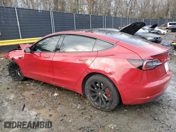 2022 Tesla Model 3 with VIN 5YJ3E1EAXNF187262, listed as a Copart auction lot 86545314 with 85,718 mi miles and Salvage Title. Bid and sale history available at DreamBid. Image 2.
