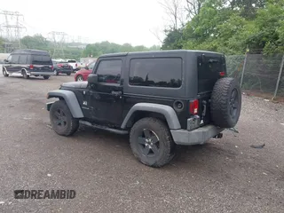 2007 Jeep Wrangler Rubicon with VIN 1J4GA64117L149666, listed as a IAAI auction lot 42252464 with 100,791 mi miles and . Bid and sale history available at DreamBid. Image 3.