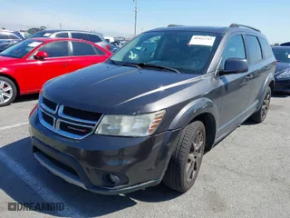 2014 Dodge Journey SXT with VIN 3C4PDCBB7ET164214, listed as a IAAI auction lot 41852243 with 213,439 mi miles. Bid and sale history available at carsss.com. Image 2.