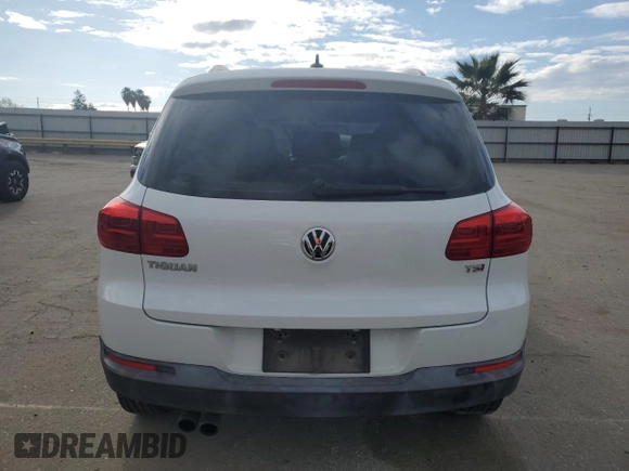 2017 Volkswagen Tiguan S with VIN WVGAV7AX9HK017871, listed as a Copart auction lot 48767785 with 49,608 mi miles and Salvage Title. Bid and sale history available at DreamBid. Image 6.