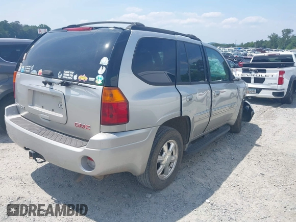 2004 GMC Envoy SLT with VIN 1GKDS13S742230325, listed as a IAAI auction lot 42385113 with 177,989 mi miles and . Bid and sale history available at DreamBid. Image 4.
