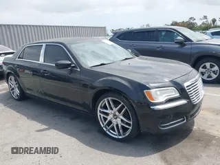2013 Chrysler 300 with VIN 2C3CCAAG3DH565628, listed as a IAAI auction lot 42110710 with 204,362 mi miles. Bid and sale history available at carsss.com. Image 1.