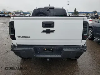 2020 Chevrolet Colorado 4WD ZR2 with VIN 1GCGTEEN3L1244554, listed as a Copart auction lot 55991425 with 79,785 mi miles and Salvage title. Bid and sale history available at DreamBid. Image 6.