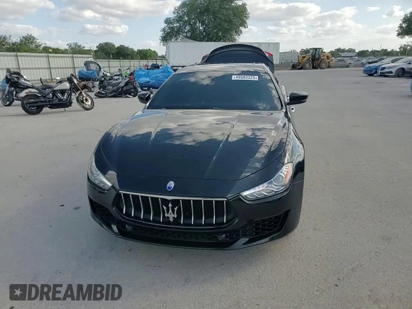 2019 Maserati Ghibli с VIN ZAM57XSA3K1311169, выставлен на аукционе Copart как лот 49583325 с пробегом 66 290 миль миль и Списание • Salvage title. История ставок и продаж доступна на DreamBid. Изображение 13.