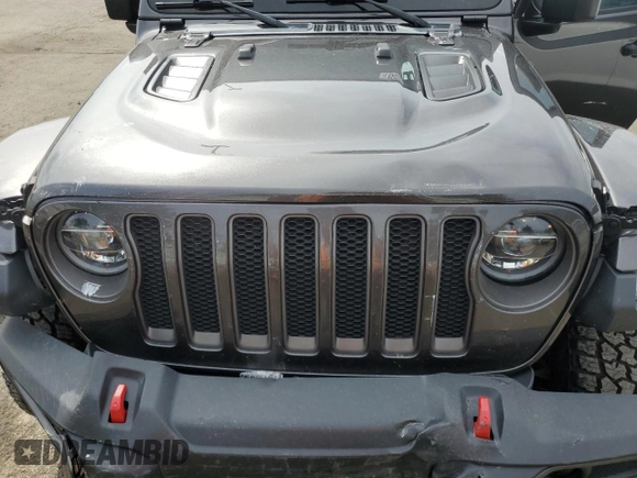 2020 Jeep Wrangler Unlimited Rubicon with VIN 1C4HJXFG4LW247603, listed as a Copart auction lot 55247645 with 44,791 mi miles and Salvage title. Bid and sale history available at DreamBid. Image 11.