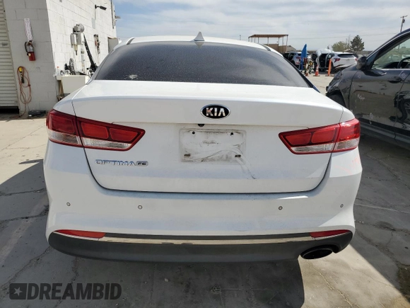 2018 Kia Optima LX z VIN 5XXGT4L39JG204573, wystawiony jako Copart lot #53162555 z przebiegiem 114 257 mil mil oraz Szkoda całkowita • Salvage title. Historia ofert i sprzedaży dostępna na DreamBid. Obrazek 6.