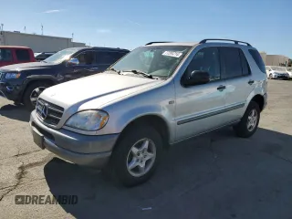 1999 Mercedes-Benz M-Class with VIN 4JGAB54E6XA117647, listed as a Copart auction lot 77284714 with 124,150 mi miles and Clean Title. Bid and sale history available at carsss.com. Image 1.