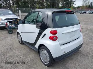 2014 Smart fortwo Pure with VIN WMEEJ3BA8EK747384, listed as a IAAI auction lot 41979651 with 29,586 mi miles and . Bid and sale history available at DreamBid. Image 3.