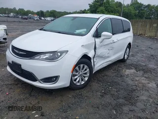 2018 Chrysler Pacifica Touring Plus z VIN 2C4RC1FG3JR102912, wystawiony jako IAAI lot #42240609 z przebiegiem 72 329 mil mil oraz . Historia ofert i sprzedaży dostępna na DreamBid. Obrazek 2.