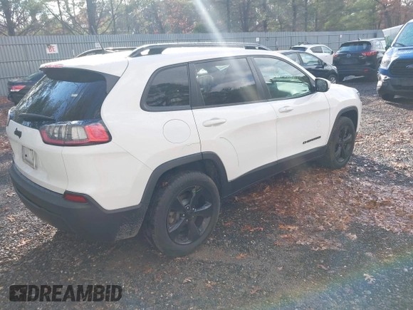 2019 Jeep Cherokee Latitude Plus with VIN 1C4PJMLB4KD321809, listed as a IAAI auction lot 40982234 with 132,496 mi miles. Bid and sale history available at carsss.com. Image 4.