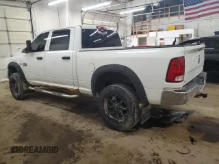 2012 Ram 2500 ST z VIN 3C6UD5CL3CG198699, wystawiony jako Copart lot #53131595 z przebiegiem 247 560 mil mil oraz Szkoda całkowita • Salvage title. Historia ofert i sprzedaży dostępna na DreamBid. Obrazek 2.