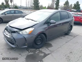 2015 Toyota Prius v Two with VIN JTDZN3EUXFJ017428, listed as a IAAI auction lot 41773045 with 215,147 mi miles. Bid and sale history available at carsss.com. Image 17.