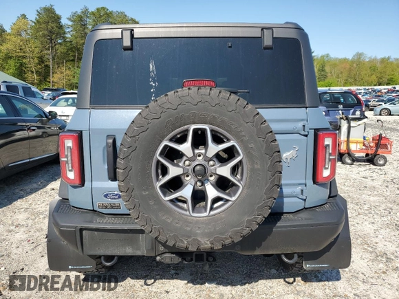 2023 Ford Bronco with VIN 1FMEE5DH2PLB00979, listed as a Copart auction lot 56652305 with 31,653 mi miles and Salvage title. Bid and sale history available at DreamBid. Image 6.