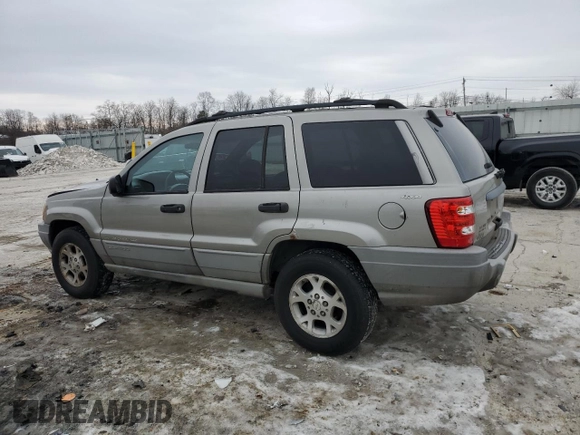 2000 Jeep Grand Cherokee Laredo z VIN 1J4GW48S8YC335926, wystawiony jako Copart lot #80693454 z przebiegiem 353 635 mil mil oraz Nie do naprawy • Non repairable. Historia ofert i sprzedaży dostępna na DreamBid. Obrazek 2.