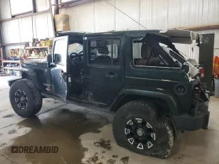 2012 Jeep Wrangler Unlimited Rubicon with VIN 1C4HJWFG4CL119390, listed as a Copart auction lot 60026425 with 305,189 mi miles and Salvage title. Bid and sale history available at DreamBid. Image 2.
